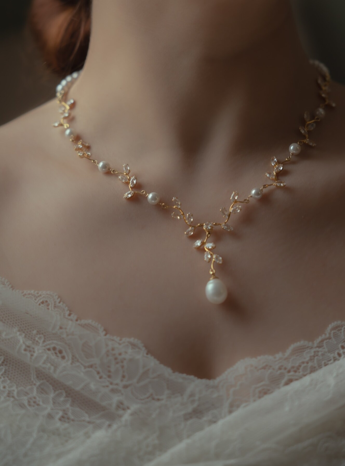 Model wearing the best-selling Orfalis necklace